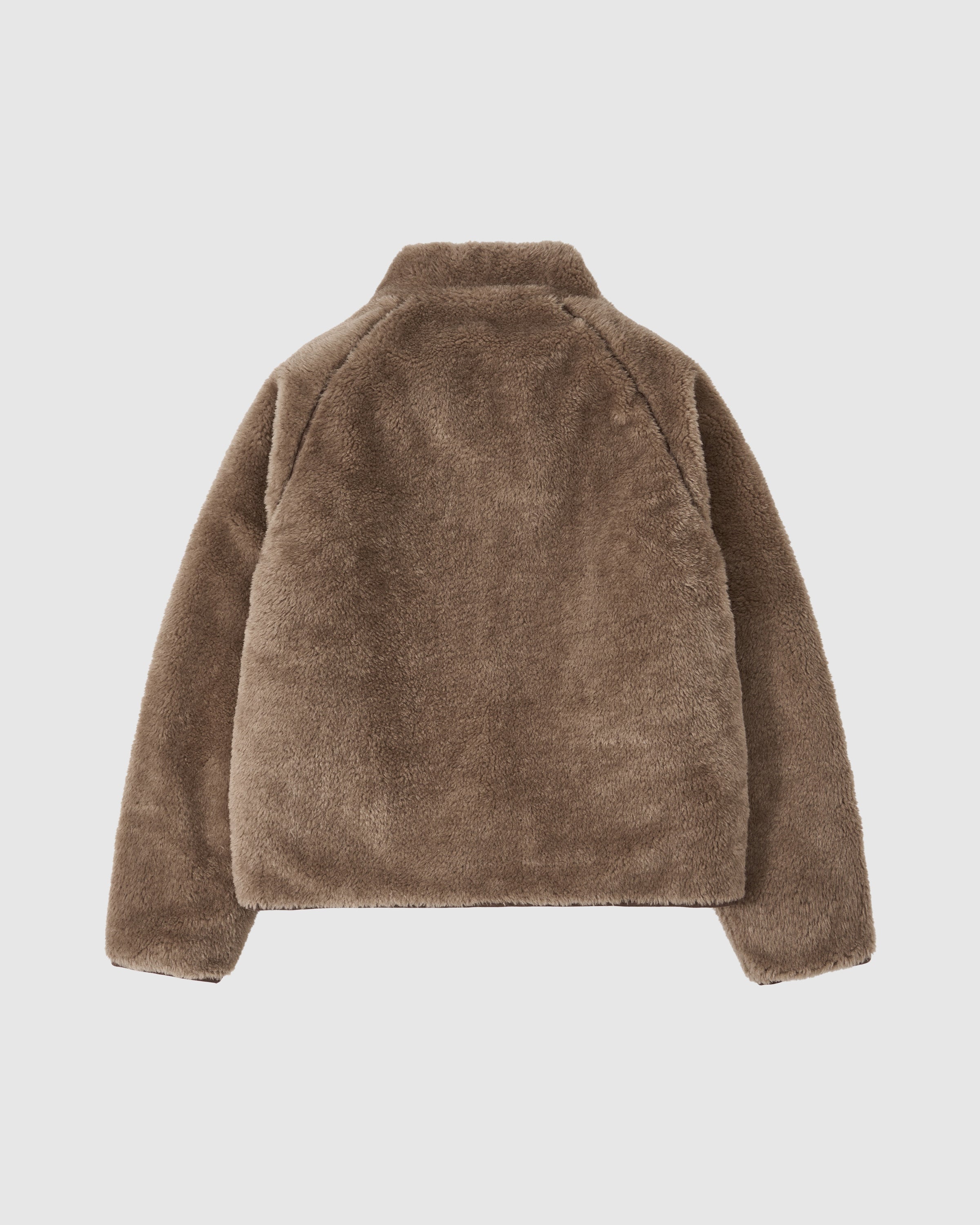 A back view of the Sundae School [PRE-ORDER] REVERSIBLE FLOWER QUILTED JEOGORI FLEECE showcases its high collar and plush, quilted fleece texture.