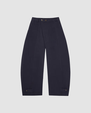 Navy blue Hanbok Balloon Pants with wide-leg silhouette, elastic waistband, two flower-shaped buttons at the front, and adjustable button tabs at the hem.