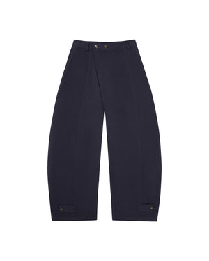 The NAVY HANBOK BALLOON PANTS by Sundae School are K-drama inspired, wide-leg navy trousers featuring a high waist, pressed front creases, and button details at the waistband and hems, shown on a white background.