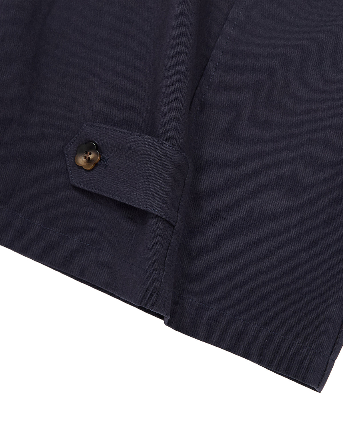 Close-up of the Sundae School NAVY HANBOK BALLOON PANTS, showcasing a dark navy, breathable cotton fabric with a strap and black button detail near the hem—an effortless K-drama inspired style.