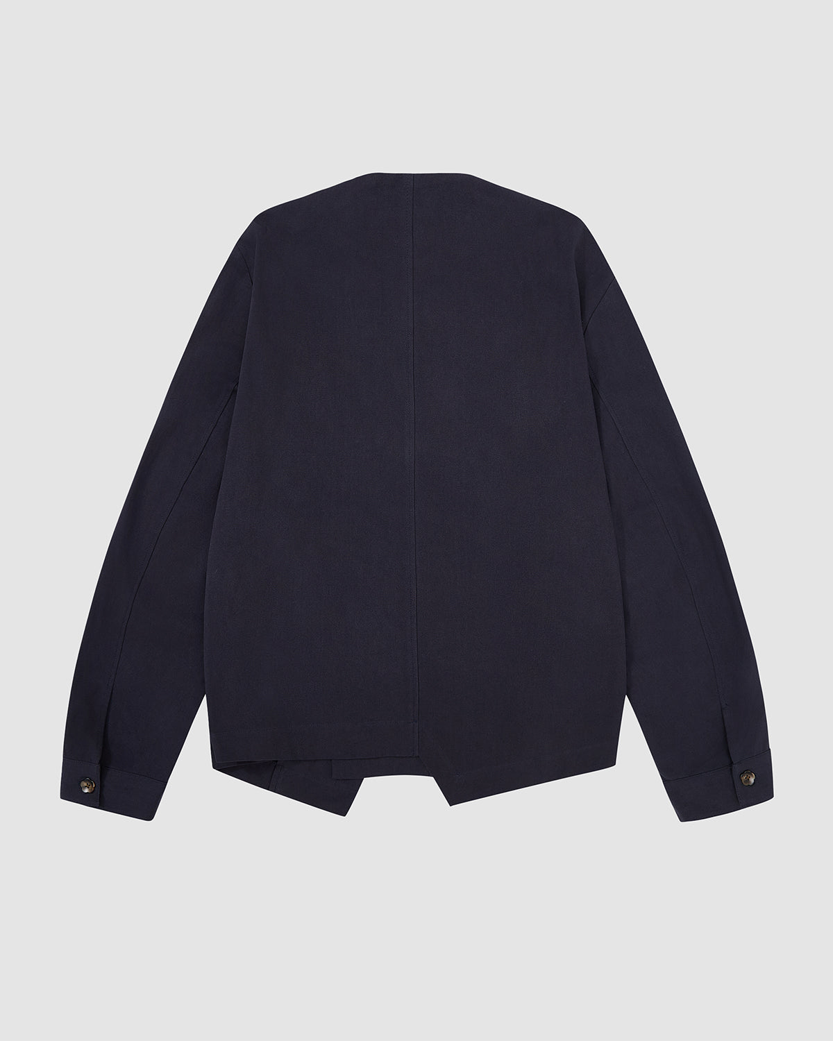 Back view of the navy blue Hanbok Tie Blazer showing the clean, minimalist design and relaxed fit.