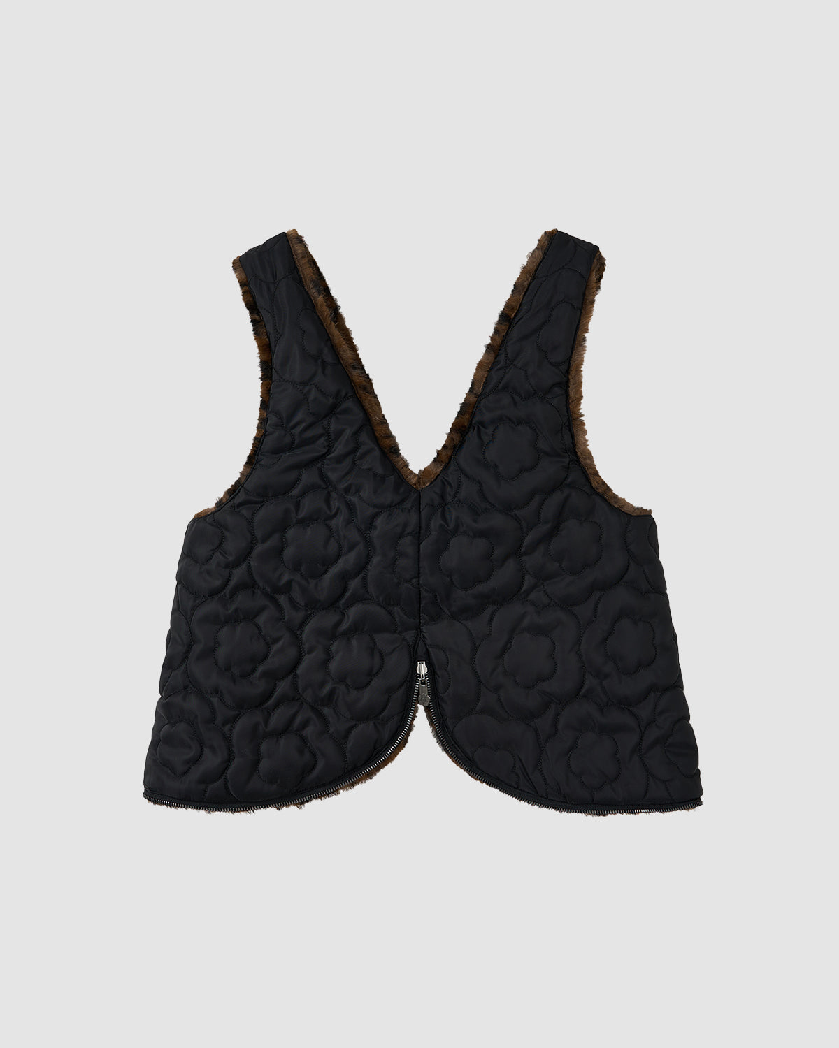 The BLACK LEOPARD BAEJA VEST / BAG by Sundae School features a deep V neckline, floral stitching, brown faux fur trim, and a curved hem, shown against a plain gray background.