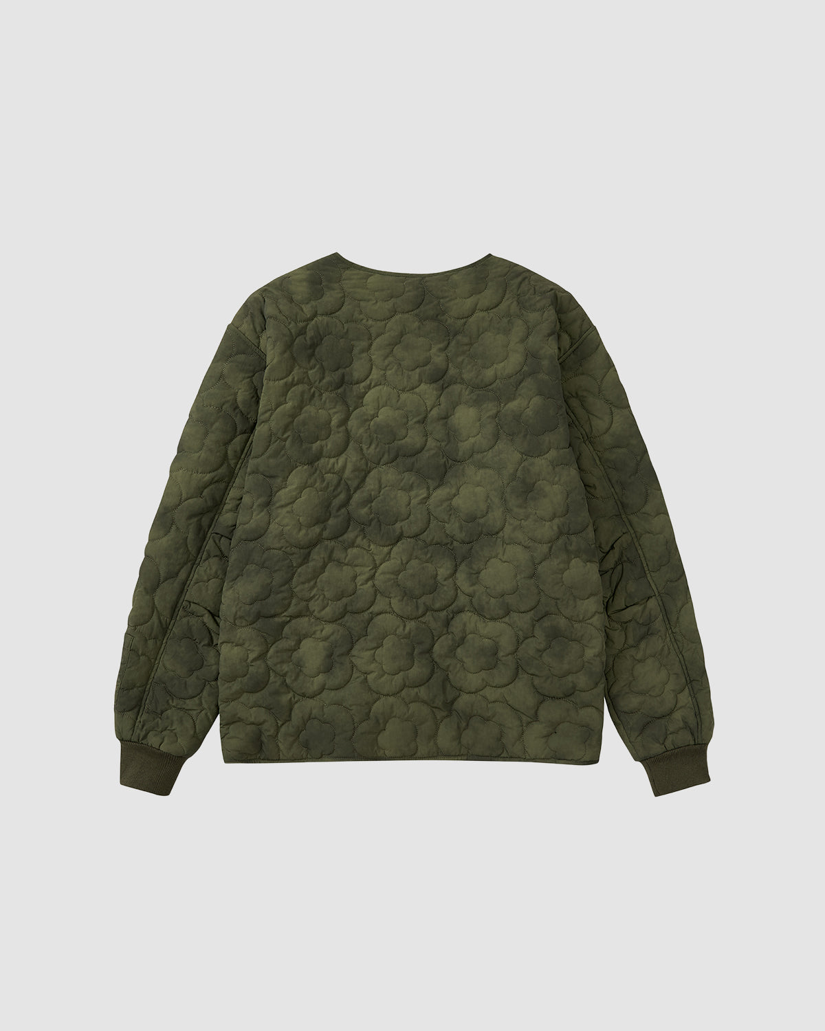 The MATCHA MOCHI QUILTED MILITARY LINER by Sundae School is an olive green, long-sleeve quilted sweatshirt with a textured floral pattern, shown from the back against a plain white background—ideal for transitional weather.