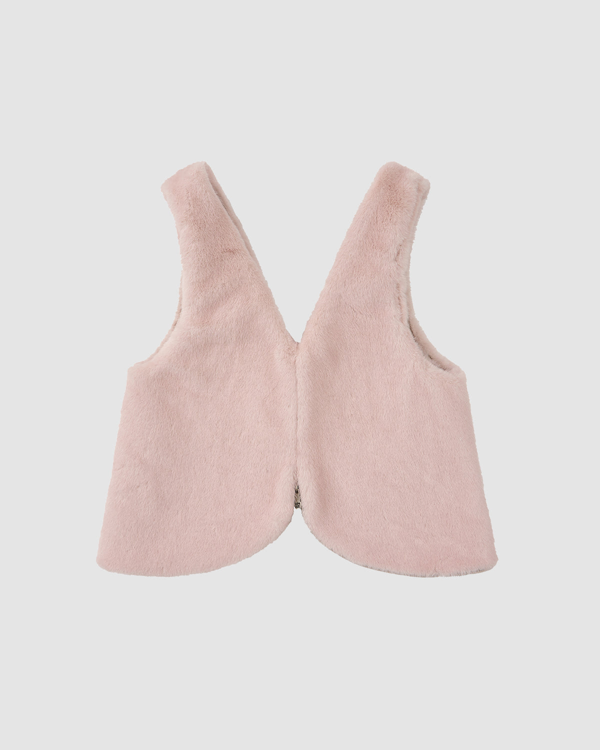 The SILVER PINK BAEJA VEST / BAG by Sundae School is a sleeveless, light pink faux fur reversible Korean vest, shown laid flat on a white background to display its back view.