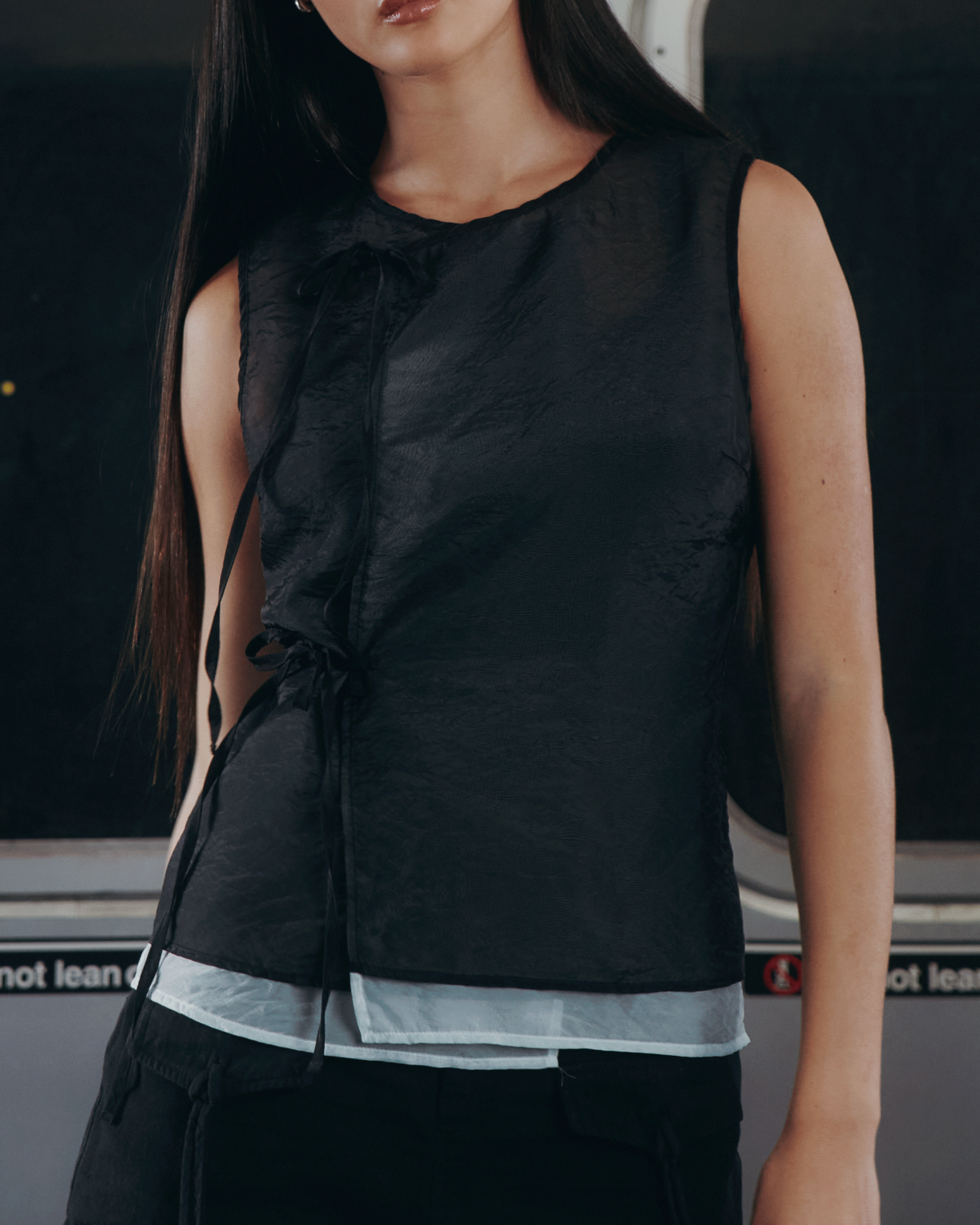 A model wearing VITA ORGANZA VEST