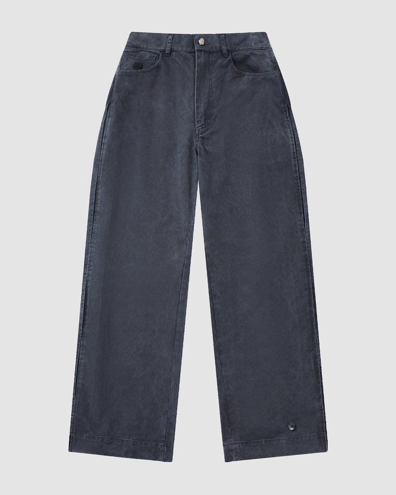 Sundae School CHARCOAL ACCORDION CHINO PANTS feature a wide-leg, high-waist silhouette in dark charcoal with front button and zip closure, two front pockets, hidden accordion pleats, and straight hem, laid flat on a light background.