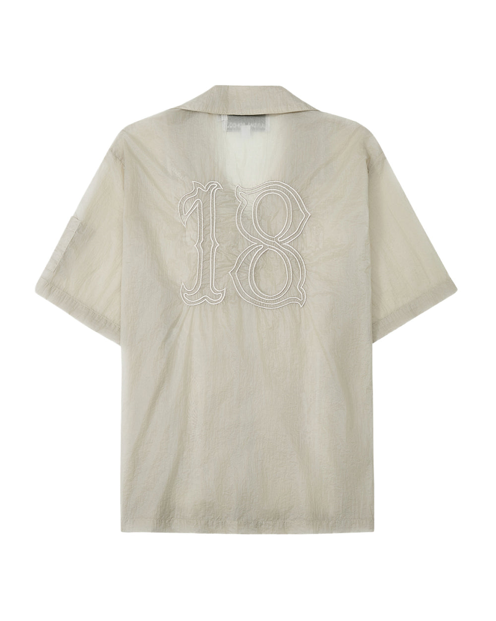 The BARONG SHIRT by Sundae School is a beige, short-sleeve collared shirt featuring a large white-outlined number 18 on the back, inspired by Filipino silhouettes and displayed against a white background.
