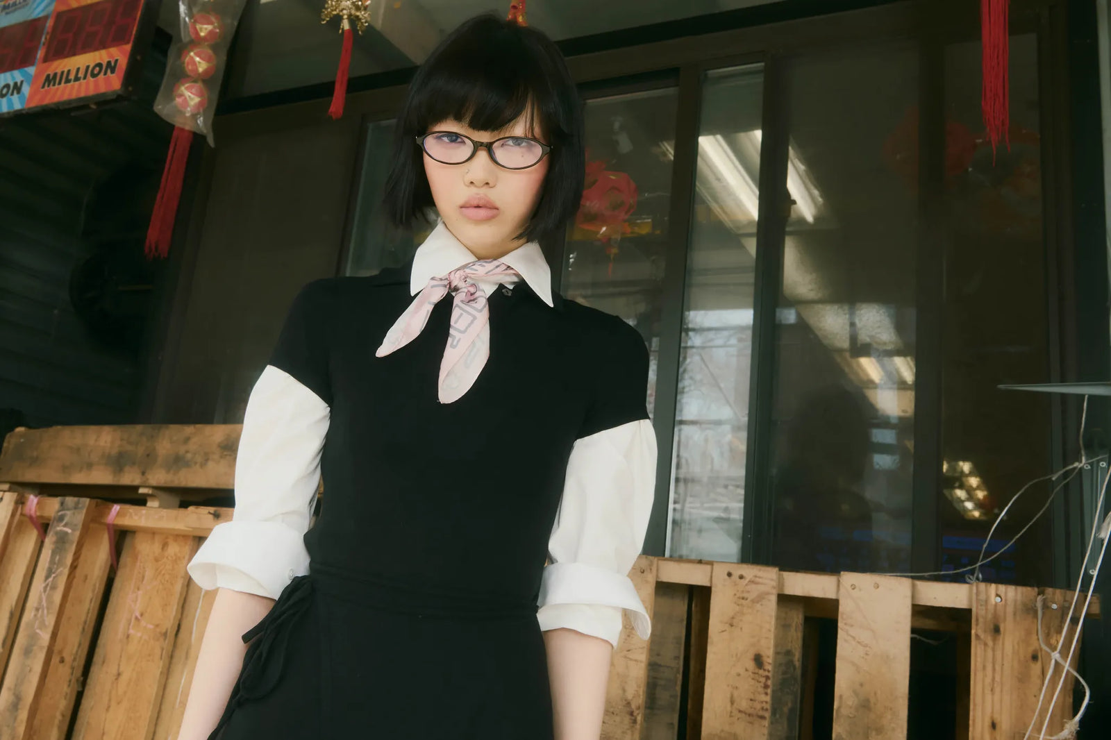 A female model glazing into a camera wearing SUNDAE SCHOOL CINDY POLO DRESS.