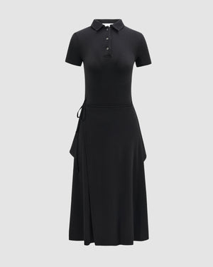 The Sundae School CINDY POLO DRESS, a black summer wool midi with short sleeves, collared neckline, buttoned placket, flared skirt, and side tie detail, is shown against a plain light background.