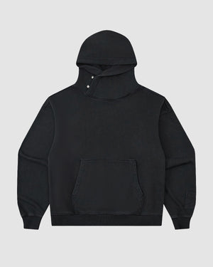 The Sundae School FADE BLACK COCOON HOODIE is a limited edition black sweatshirt featuring an oversized hood, front kangaroo pocket, and snap-button neck closure, shown on a plain light gray background.