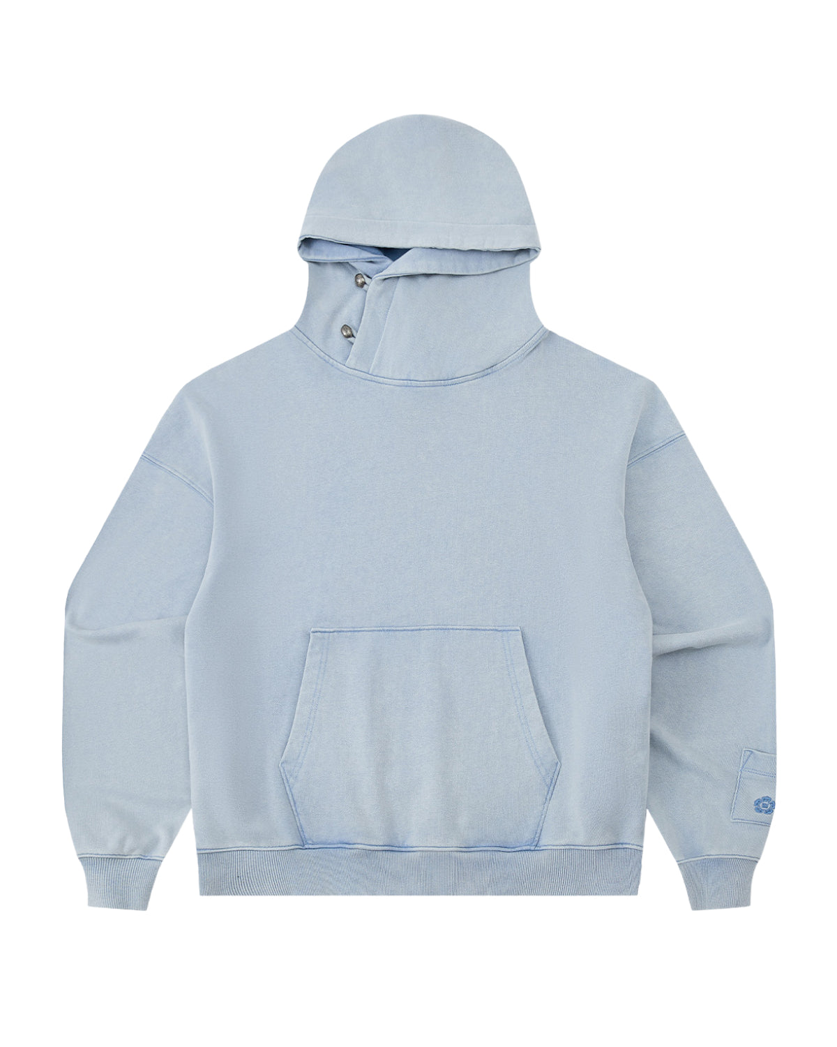 The SKY BLUE COCOON HOODIE by Sundae School features a light blue hue, high neck with snap buttons at the collar, peret sleeves, an oversized hood, long sleeves, and a spacious front pocket.