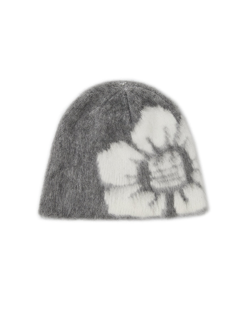 GREY DDUL BEANIE in grey knit with a large white flower pattern, offering style that prioritizes brain protection.