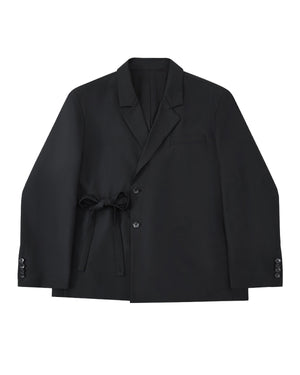 The BLACK DOUBLE DUTY BLAZER by Sundae School features a notched lapel, button closure, and hidden left-side goreum tie waist, shown laid flat on a light gray background.