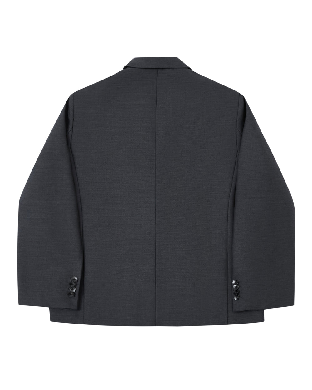 The CHARCOAL DOUBLE DUTY BLAZER by Sundae School is presented from the back, showcasing its dark gray premium wool blend fabric, long sleeves with buttoned cuffs, and a central vertical seam. This piece is crafted in a modern hanbok silhouette.