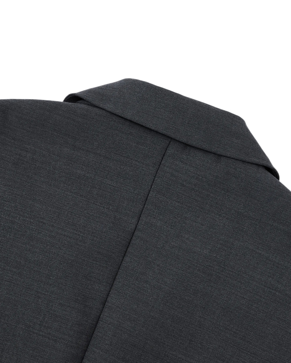 Close-up of the back of Sundae School’s CHARCOAL DOUBLE DUTY BLAZER, featuring the collar, shoulder seam, and smooth textured fabric inspired by a hanbok silhouette.