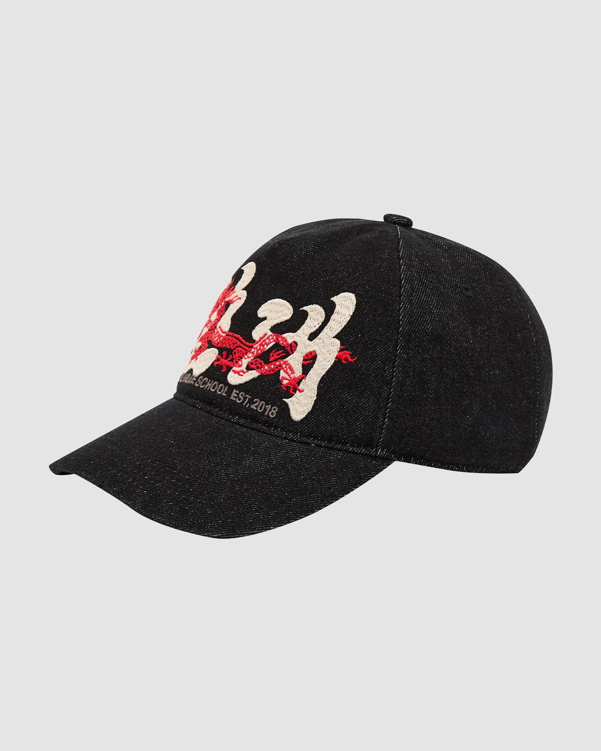 The BLACK DRAGON CAP by Sundae School features bold red and white Korean dragon embroidery, 