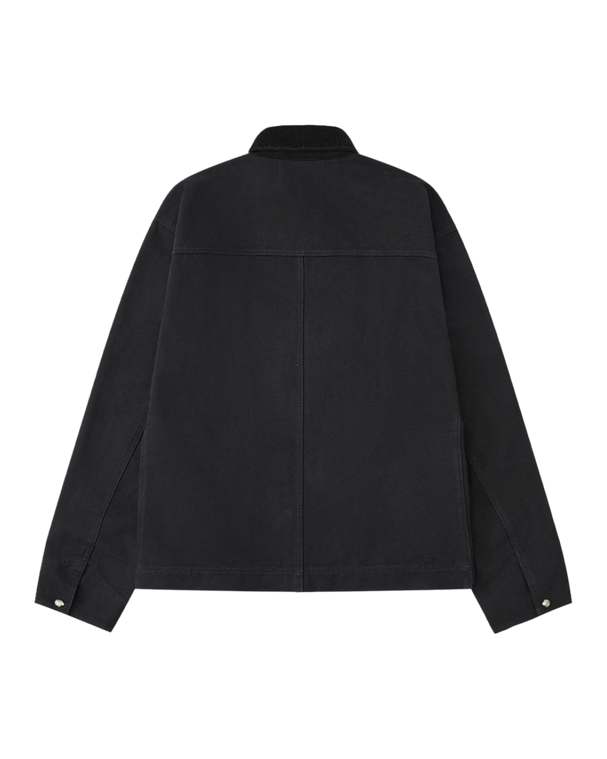 The BLACK FIREMAN CLASP JACKET by Sundae School is displayed from the back, showcasing long sleeves, a straight hem, and a prominent seam running across the upper back. Buttoned cuffs and a contrasting textured collar lend subtle vintage character to this utilitarian workwear-inspired piece.