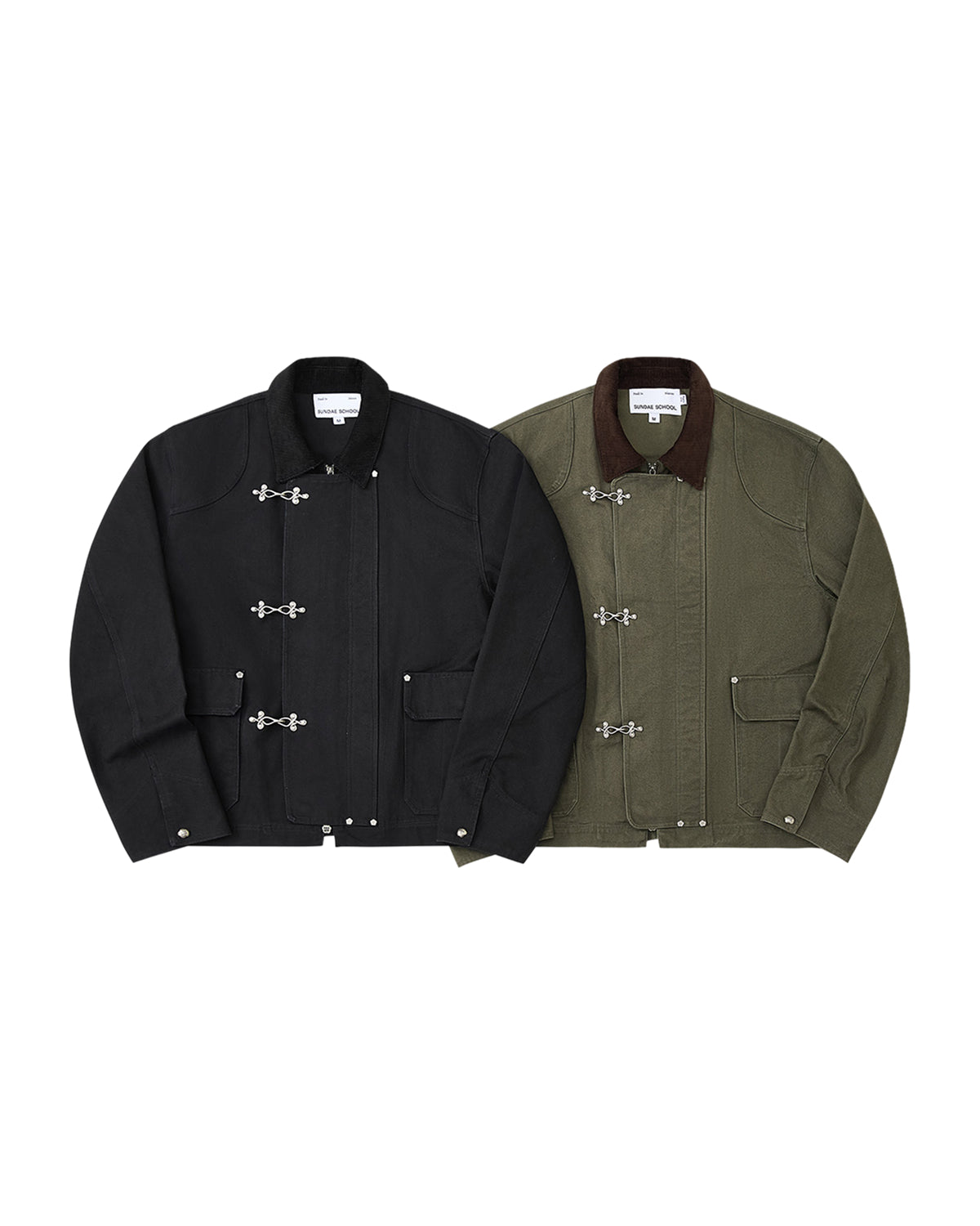 Two BLACK FIREMAN CLASP JACKETS by Sundae School side by side: one in black with a matching black collar, the other in olive green with a contrasting brown collar. Both jackets feature custom Mochi Floral fireman clasps as front toggle closures, along with large front pockets that add a vintage touch to this workwear-inspired design.