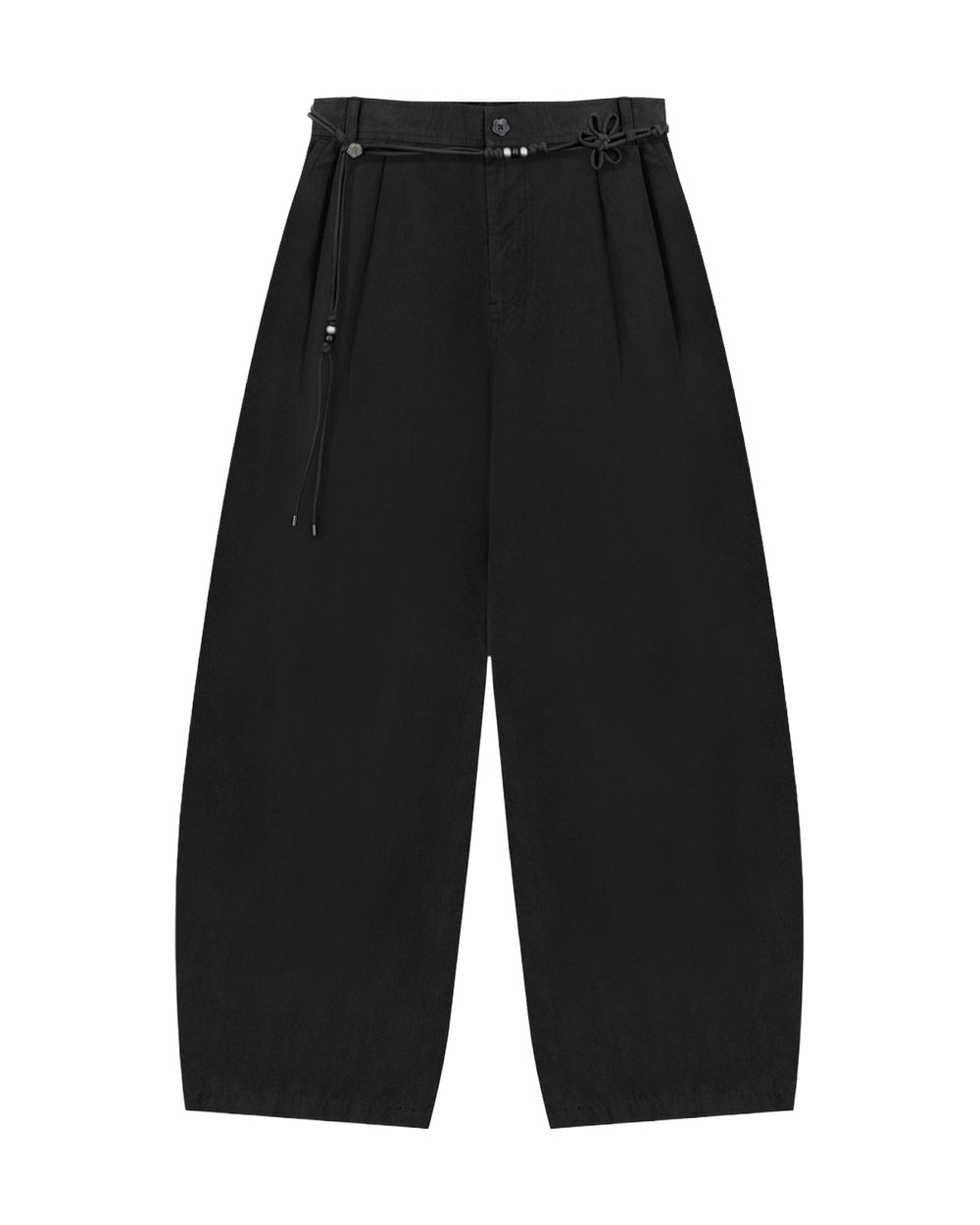 The BLACK FLOWER NORIGAE LINEN TROUSERS by Sundae School are wide-leg, high-waisted black pants with pleats at the top and a thin decorative norigae belt featuring a knotted detail on the right side. These Korean-inspired trousers are laid flat on a white background.