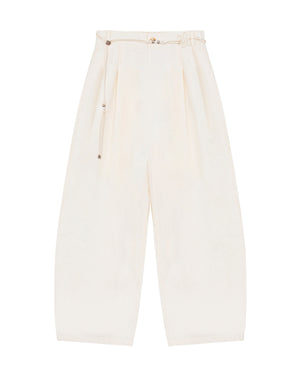 The IVORY FLOWER NORIGAE LINEN TROUSERS by Sundae School are high-waisted, wide-leg cream-colored pants crafted from a cotton-linen blend. Featuring balloon-shaped legs, pleats, an ankle-length cut, and a slim matching norigae belt, these trousers offer a loose, comfortable fit.