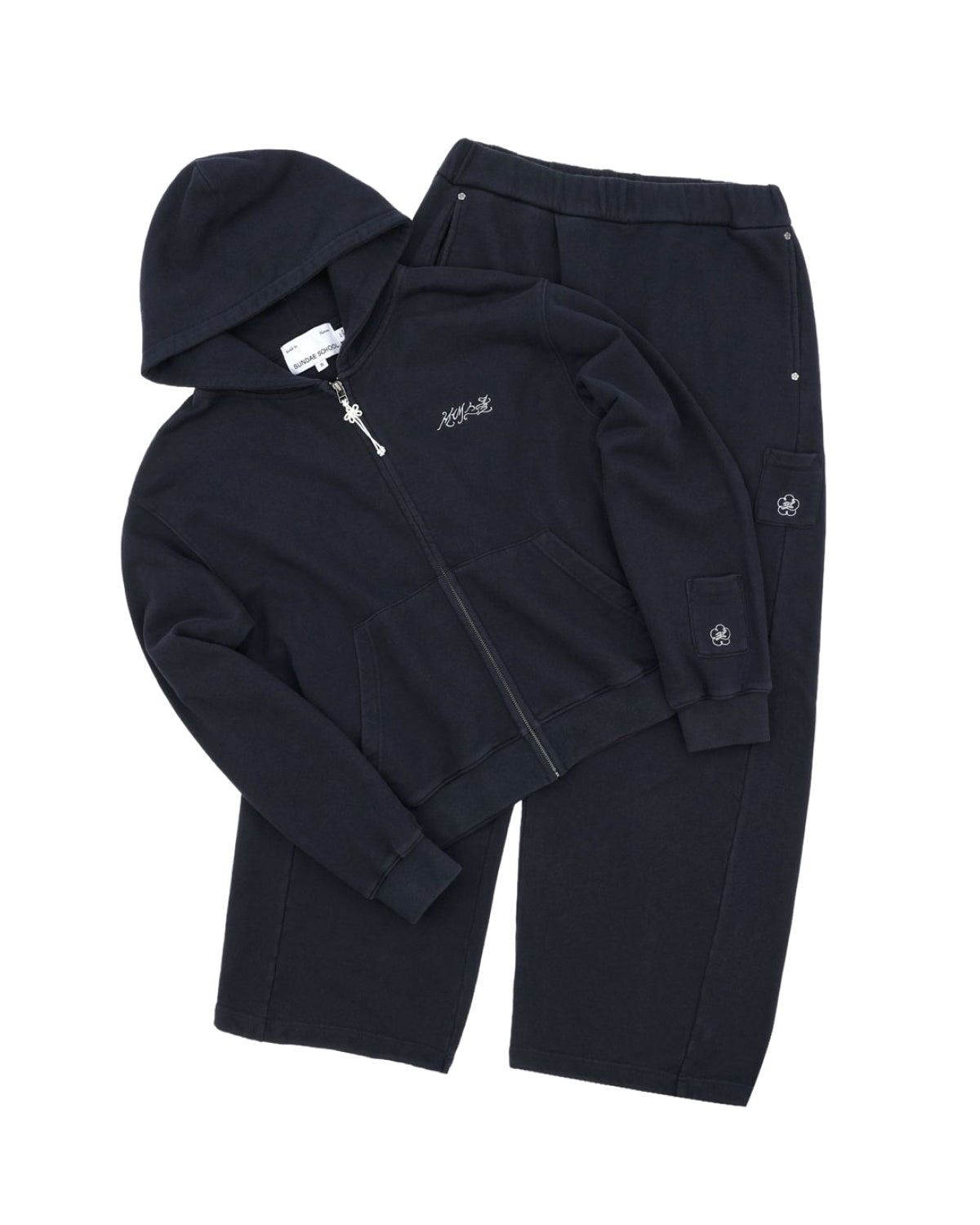 A navy cotton zip-up hoodie with a hood and matching navy sweatpants with pockets, both featuring small embroidered Hangul Sundae School logos and subtle wash flower knot detailing.