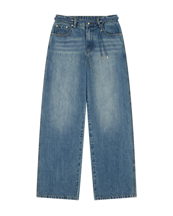 MEDIUM BLUE FRESHMAN FIT DENIM by Sundae School, featuring a wide-leg silhouette in a medium blue faded wash, five pockets, and a drawstring norigae belt waistband, laid flat on a white background.