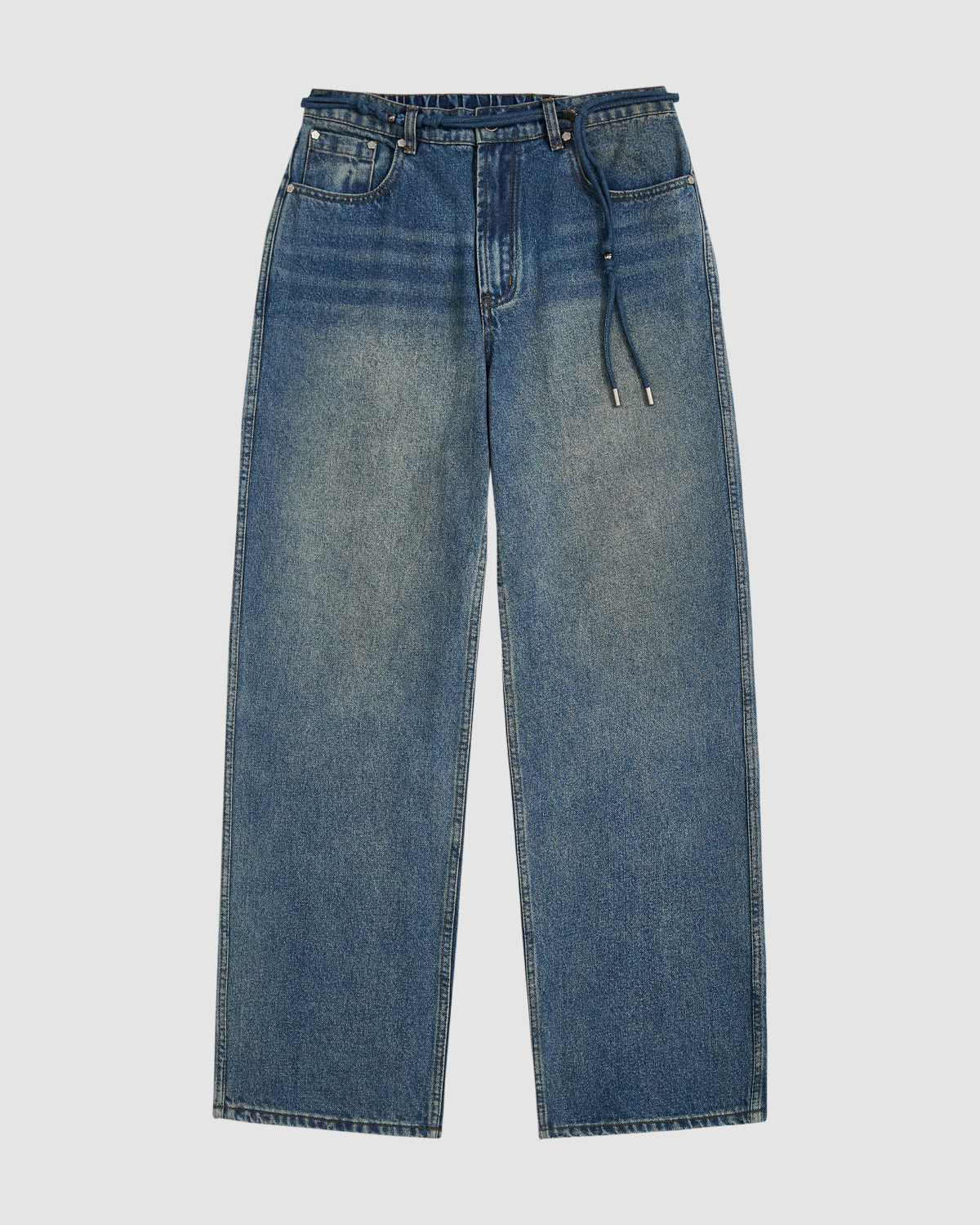 The MEDIUM BLUE FRESHMAN FIT DENIM by Sundae School is a pair of blue relaxed straight-leg jeans with a five-pocket design and drawstring belt, laid flat on a white background.