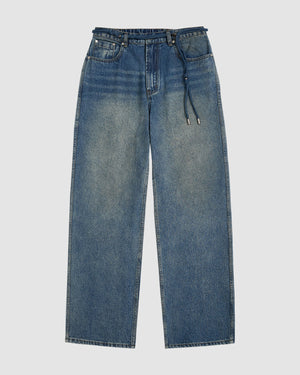 The MEDIUM BLUE FRESHMAN FIT DENIM by Sundae School is a pair of blue relaxed straight-leg jeans with a five-pocket design and drawstring belt, laid flat on a white background.