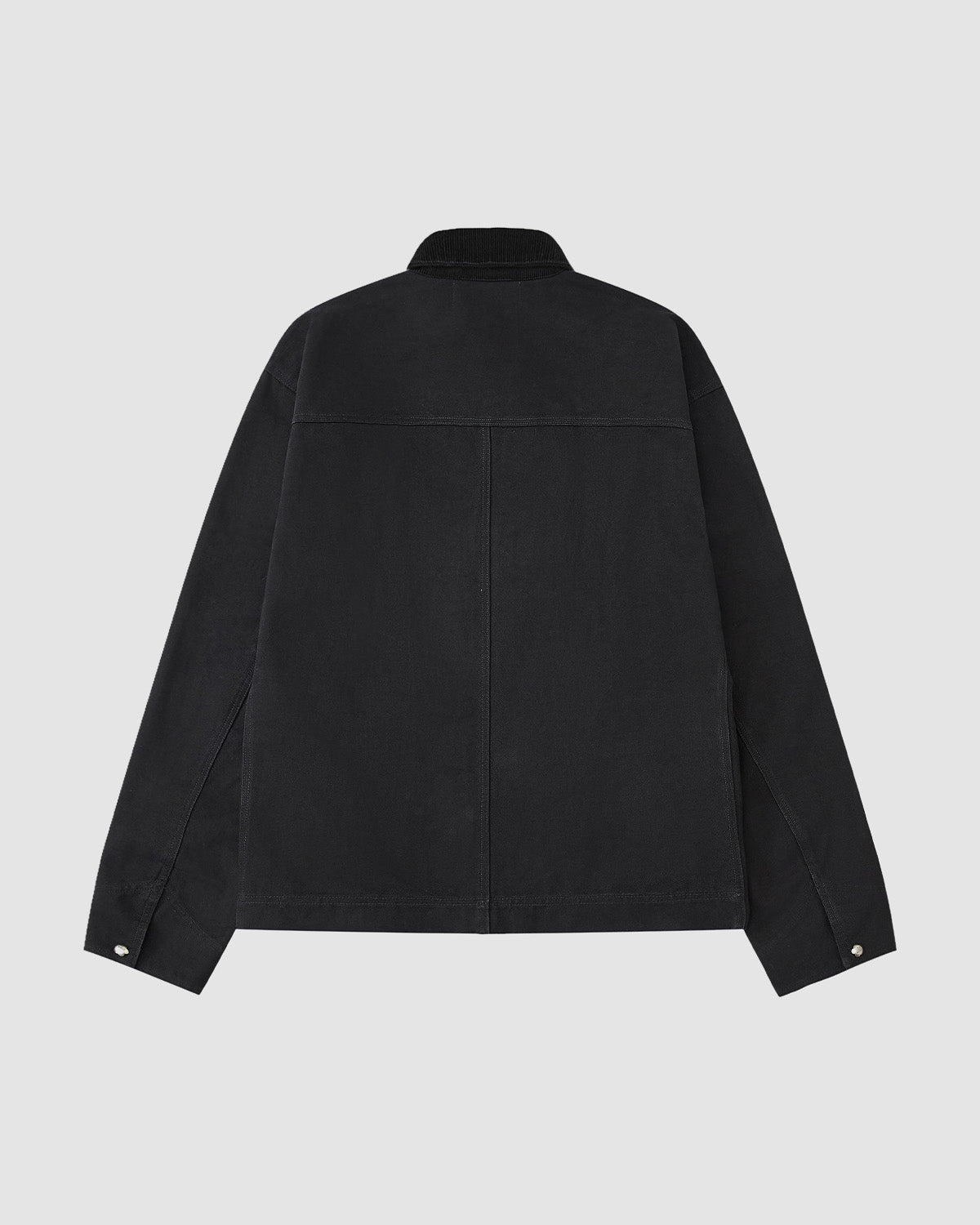 The [PRE-ORDER] BLACK FIREMAN CLASP JACKET by Sundae School is displayed on a plain light gray background from the back, featuring long sleeves, buttoned cuffs, a straight hem, and a minimalistic workwear-inspired design.