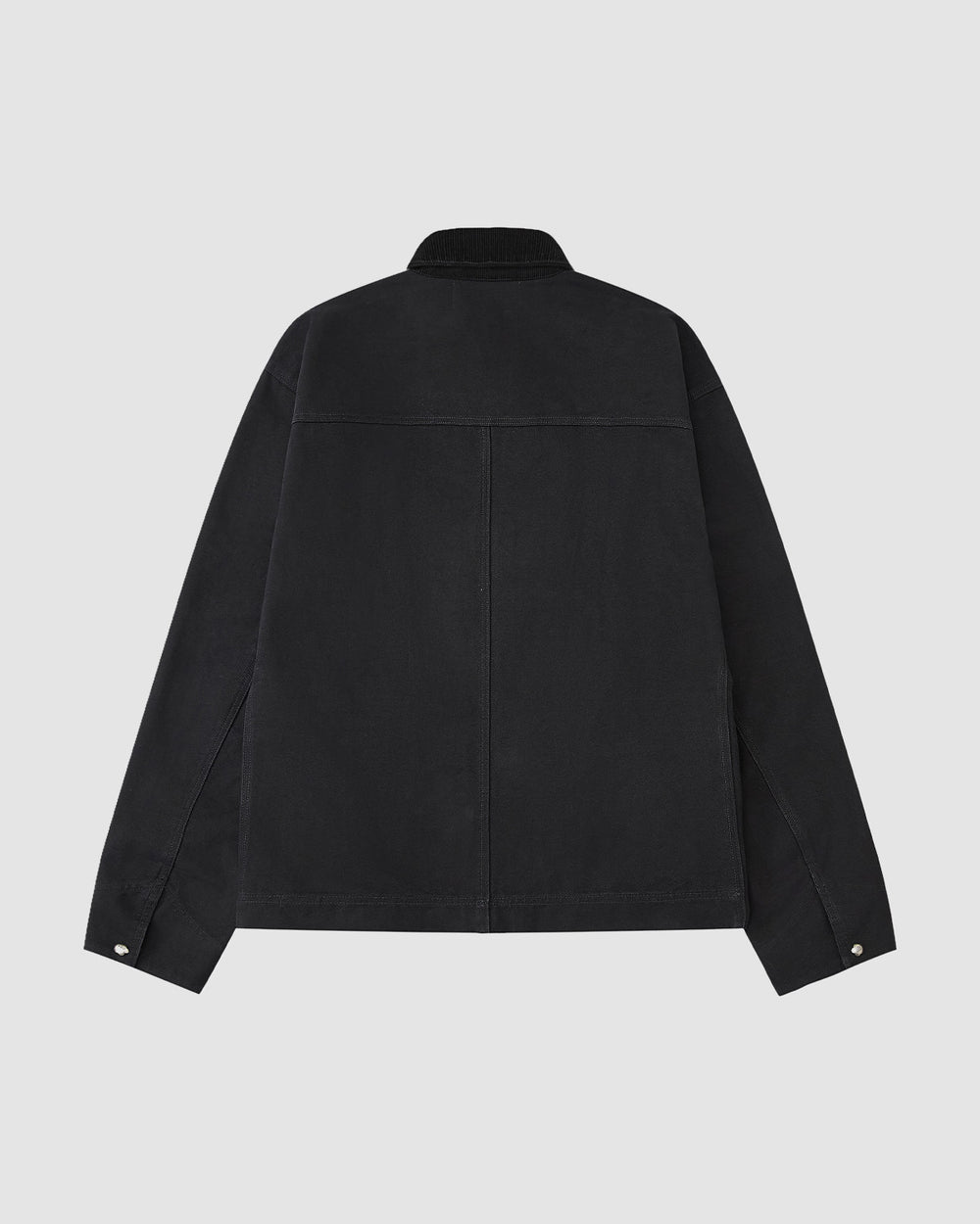 The [PRE-ORDER] BLACK FIREMAN CLASP JACKET by Sundae School is displayed on a plain light gray background from the back, featuring long sleeves, buttoned cuffs, a straight hem, and a minimalistic workwear-inspired design.