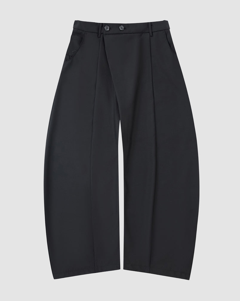 Sundae School’s BLACK PLEATED HANBOK SLACKS are wide-leg, high-waisted black wool pants with double-button closure, pleats, side pockets, and a relaxed fit—modern unisex style shown on a plain light gray background.