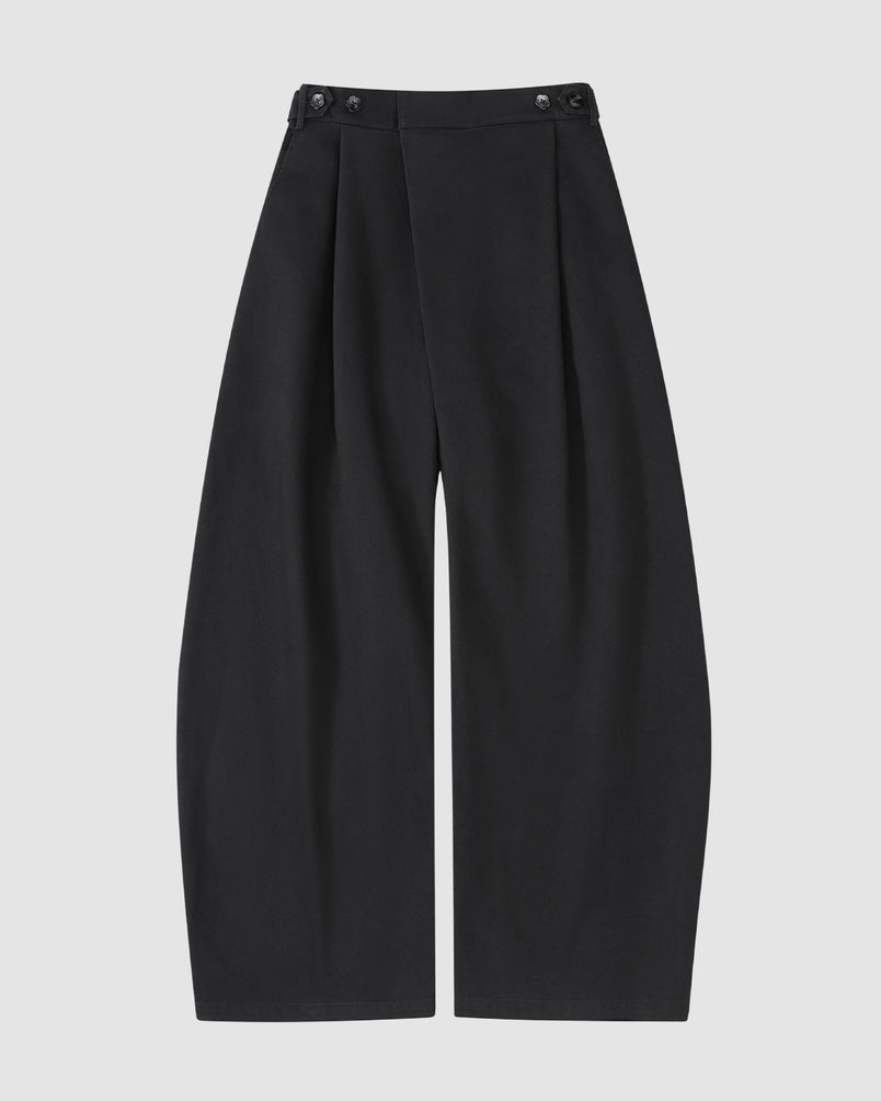 The BLACK HANBOK CHINO PANTS by Sundae School are wide-leg, high-waisted unisex chinos with front pleats and button details, featuring a hanbok-inspired silhouette. Shown laid flat on a white background.