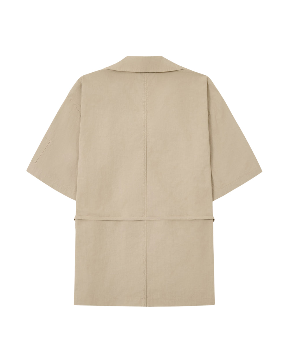The WHEAT HANBOK LINEN SHIRT by Sundae School is showcased against a white background, featuring a beige hue, short sleeves, and knee-length cut. Crafted from a cotton-linen blend, it’s shown from the back with a simple collar and minimal seams—perfect for layering over your favorite summer shirt.