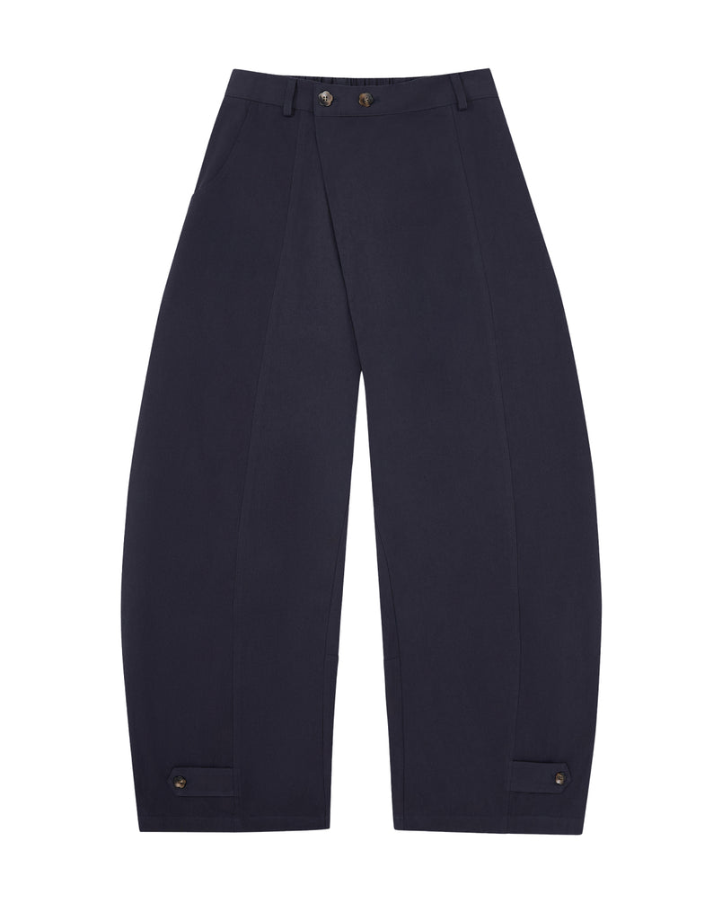 The NAVY HANBOK BALLOON PANTS by Sundae School, inspired by K-drama style, showcase a stylish balloon silhouette with wide legs, an elastic waistband, spacious front pockets, and button accents at the ankles. Crafted from breathable cotton in a navy blue shade, these pants are laid flat on a white background—perfect for elevating any casual look.