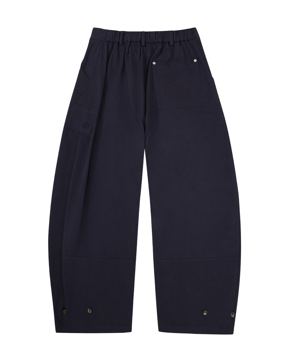 The NAVY HANBOK BALLOON PANTS by Sundae School are K-drama inspired, wide-leg navy trousers featuring a high waist, pressed front creases, and button details at the waistband and hems, shown on a white background.
