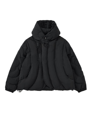 The BLACK HEAVYWEIGHT MOCHI PUFFER by Sundae School is a black, heavyweight puffer jacket featuring a high collar, large quilted sections, front button closures, side pockets, and elastic cuffs. Displayed against a plain white background, this jacket is filled with cozy duck down for enhanced warmth and comfort.