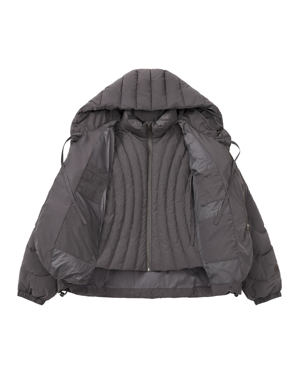 The CHARCOAL HEAVYWEIGHT MOCHI PUFFER by Sundae School is a dark gray puffer jacket featuring a hood, zippered front, and a quilted duck down-filled interior, shown open and laid flat on a white background.