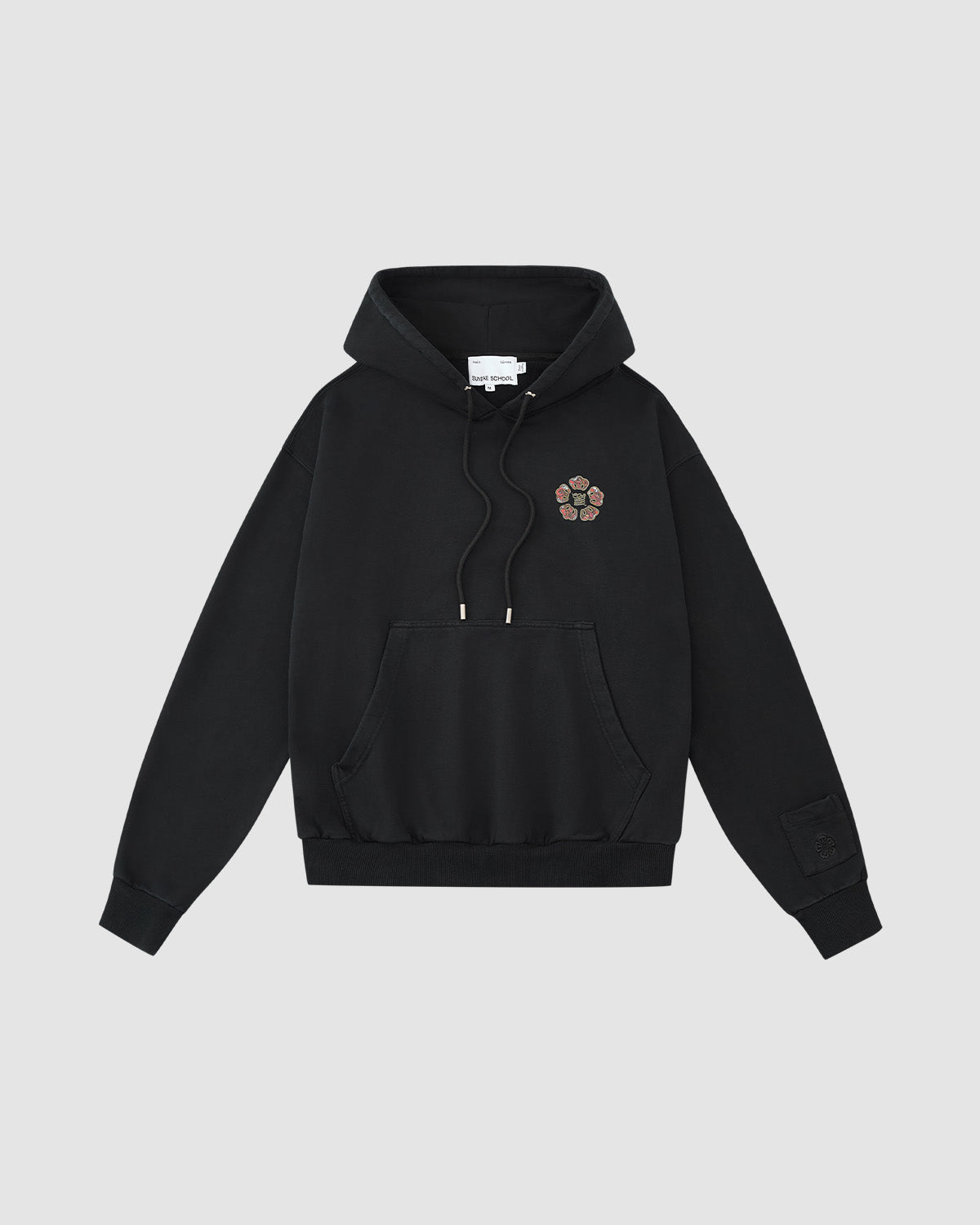The HIGH HORSE LNY HOODIE by Sundae School features a black design with a front pocket, drawstrings, a small multicolored emblem on the left chest, and a patch on the left sleeve, shown on a light gray background.