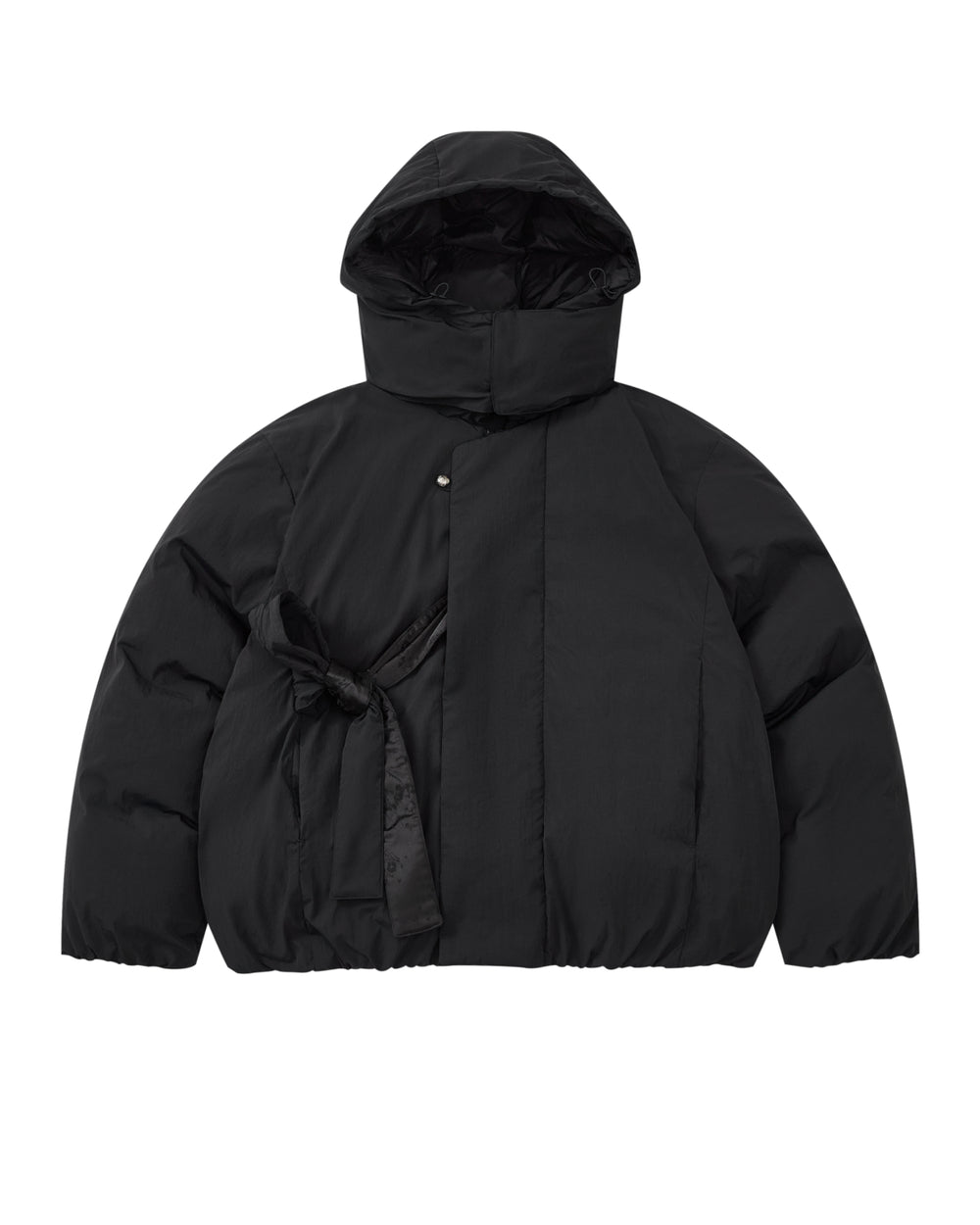 Introducing the BLACK IBUL DOWN PUFFER by Sundae School: an oversized black puffer jacket featuring a high collar, snap button closure, and a unique tied fabric belt detail on the left side of the waist. This style is designed with a detachable hood for versatile wear.