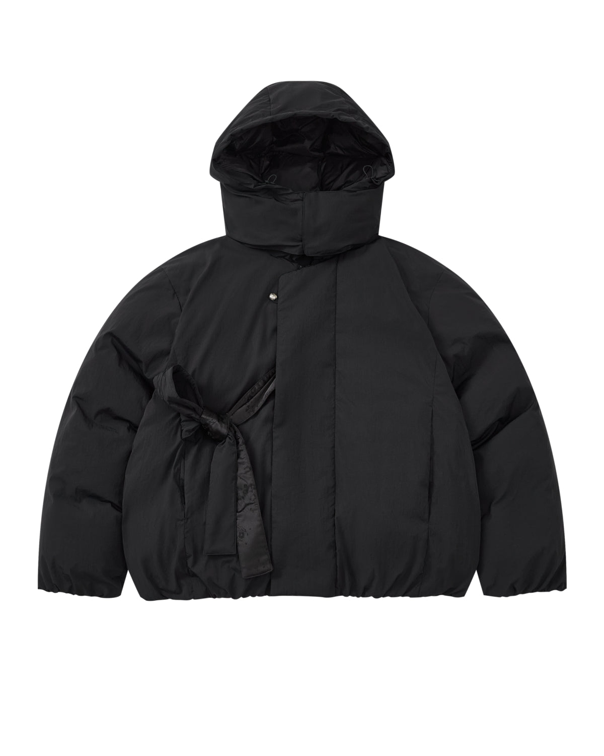 Introducing the BLACK IBUL DOWN PUFFER by Sundae School: an oversized black puffer jacket featuring a high collar, snap button closure, and a unique tied fabric belt detail on the left side of the waist. This style is designed with a detachable hood for versatile wear.