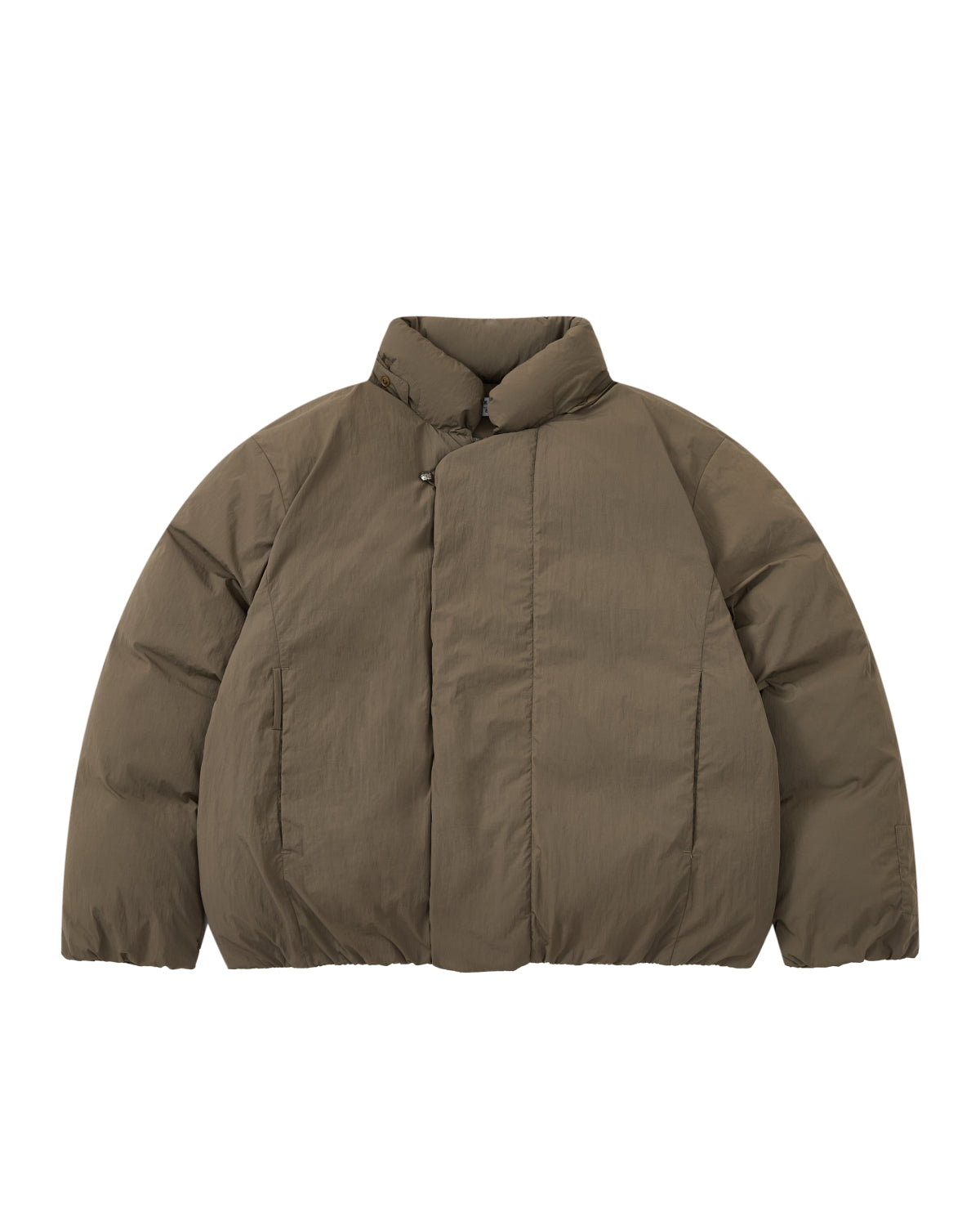 The DEEP BROWN IBUL DOWN PUFFER by Sundae School is a puffy winter jacket in a rich brown shade, featuring a high collar and long sleeves. Laid flat on a white background, this cocoon-style puffer includes a hidden front closure, side pockets, and offers a relaxed silhouette designed for cozy warmth.