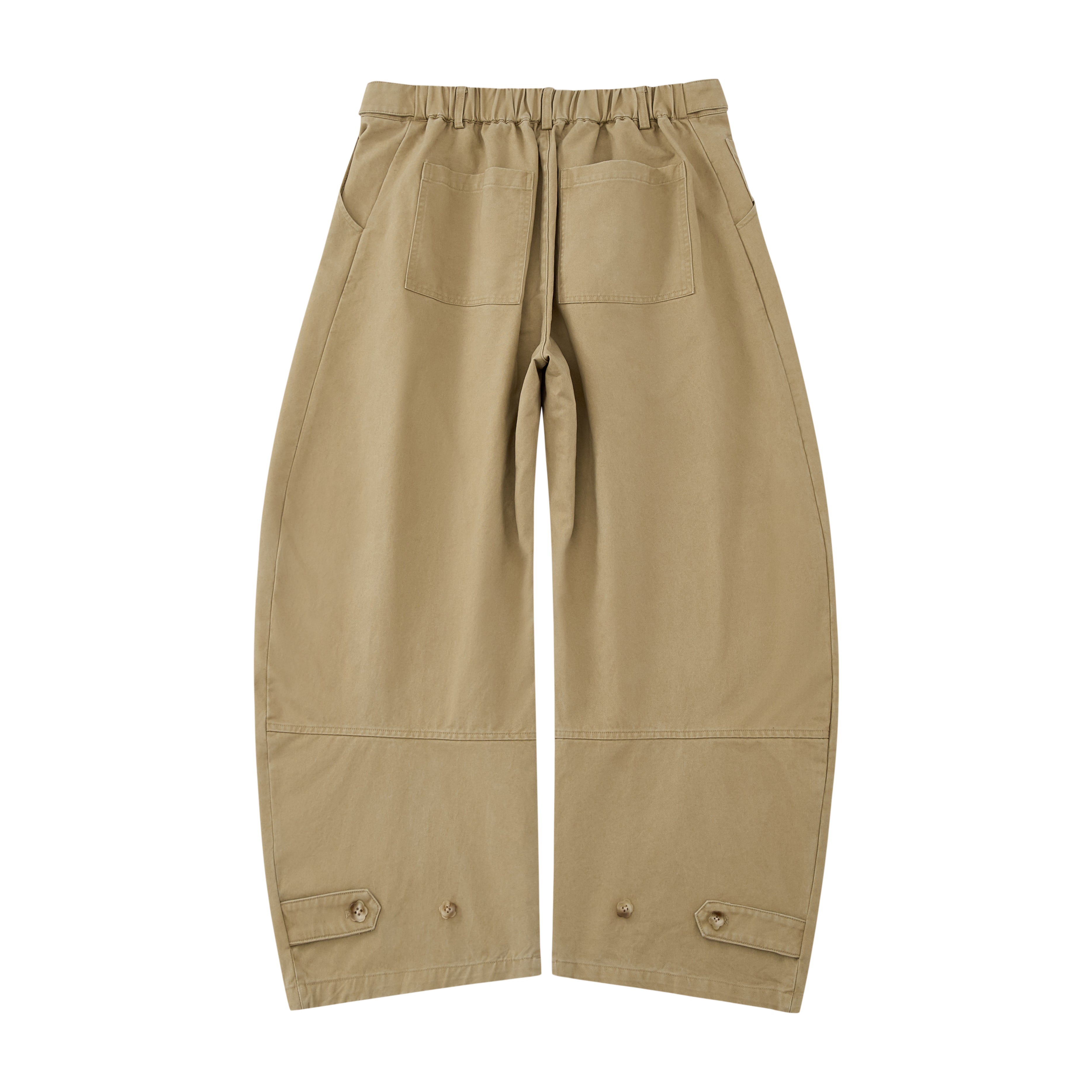 The Tan Hanbok Chino Pants by Sundae School feature a wide-leg, high-waisted barrel-fit chino silhouette with pleats and button details, inspired by classic hanbok styles, shown on a plain white background.