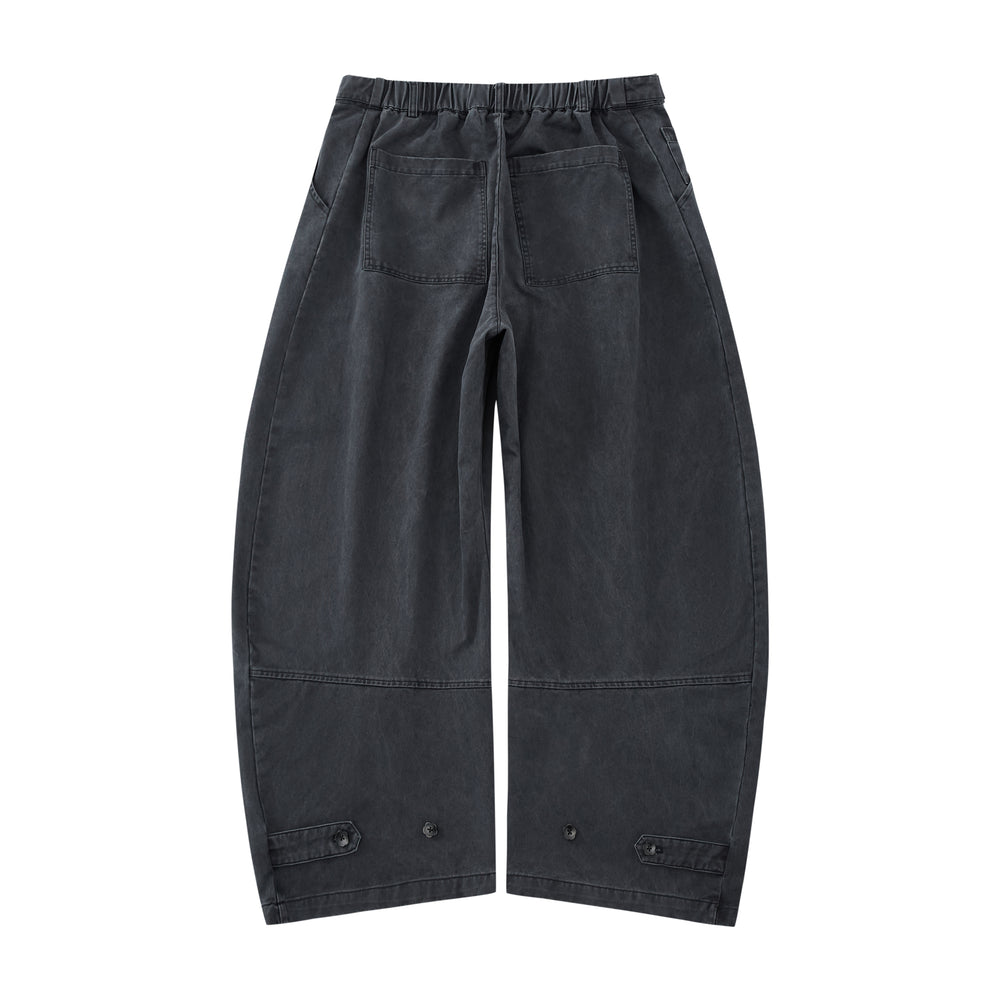 The Charcoal Hanbok Chino Pants by Sundae School feature a wide-leg, high-waisted barrel-fit chino silhouette with pleats and button details, inspired by classic hanbok styles, shown on a plain white background.