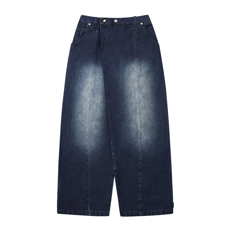 A pair of dark blue denim jeans with a faded light blue wash on the front, photographed flat against a solid white background.
