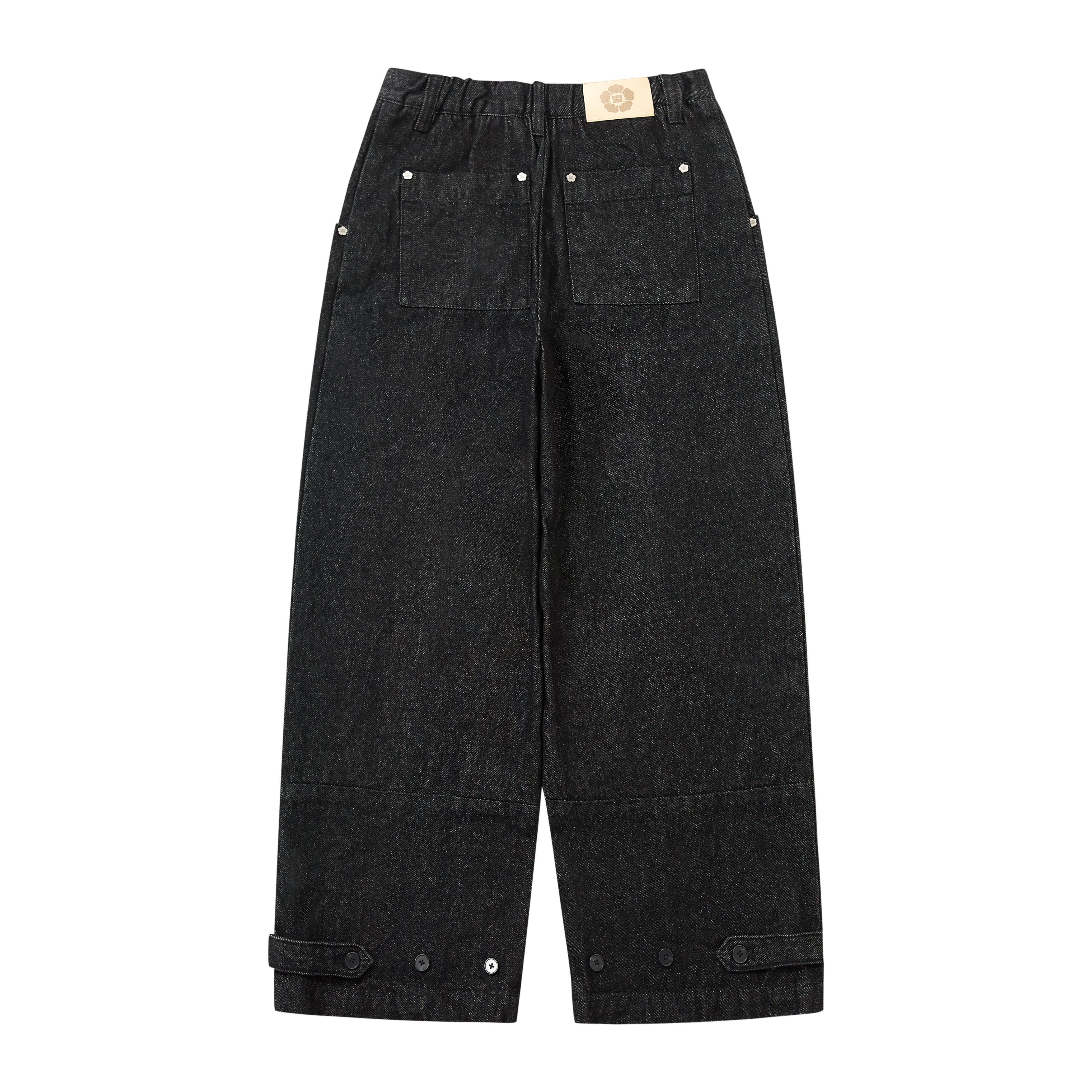 Black wide-leg denim pants with an elastic waistband, front patch pockets, and buttoned cuff tabs, shown flat on a white background.