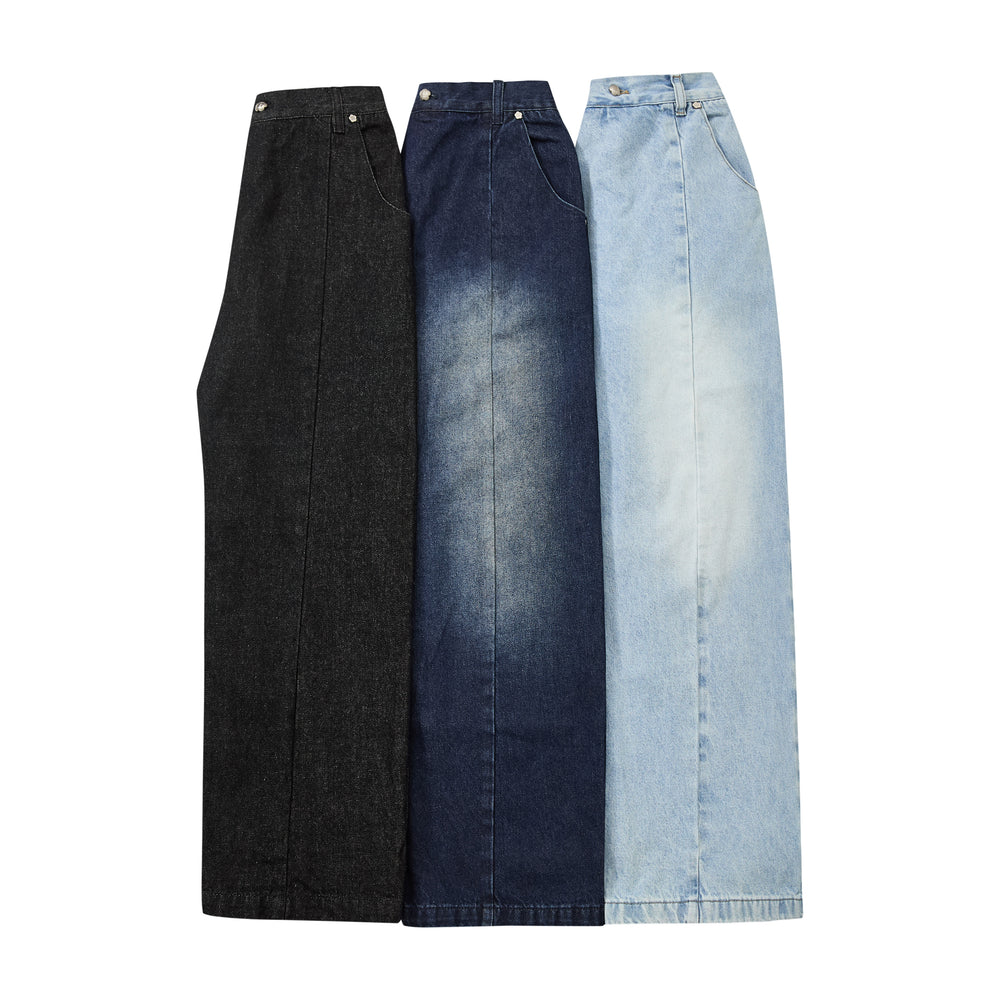 Three wide-leg denim pants in different washes are displayed side-by-side against a plain white background. The left pair is black, the middle pair is dark blue with a faded wash, and the right pair is a light blue wash.