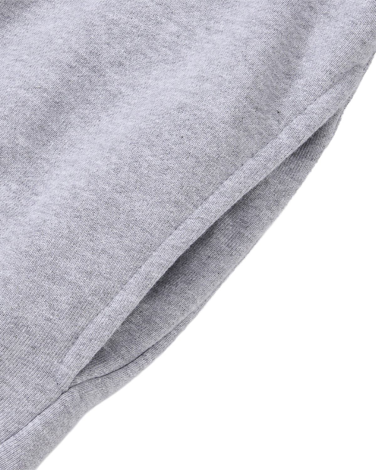Close-up of a pocket on the HEATHER GREY KNIT TIE HOODIE by Sundae School, highlighting the light gray fabric’s texture and detailed stitching.