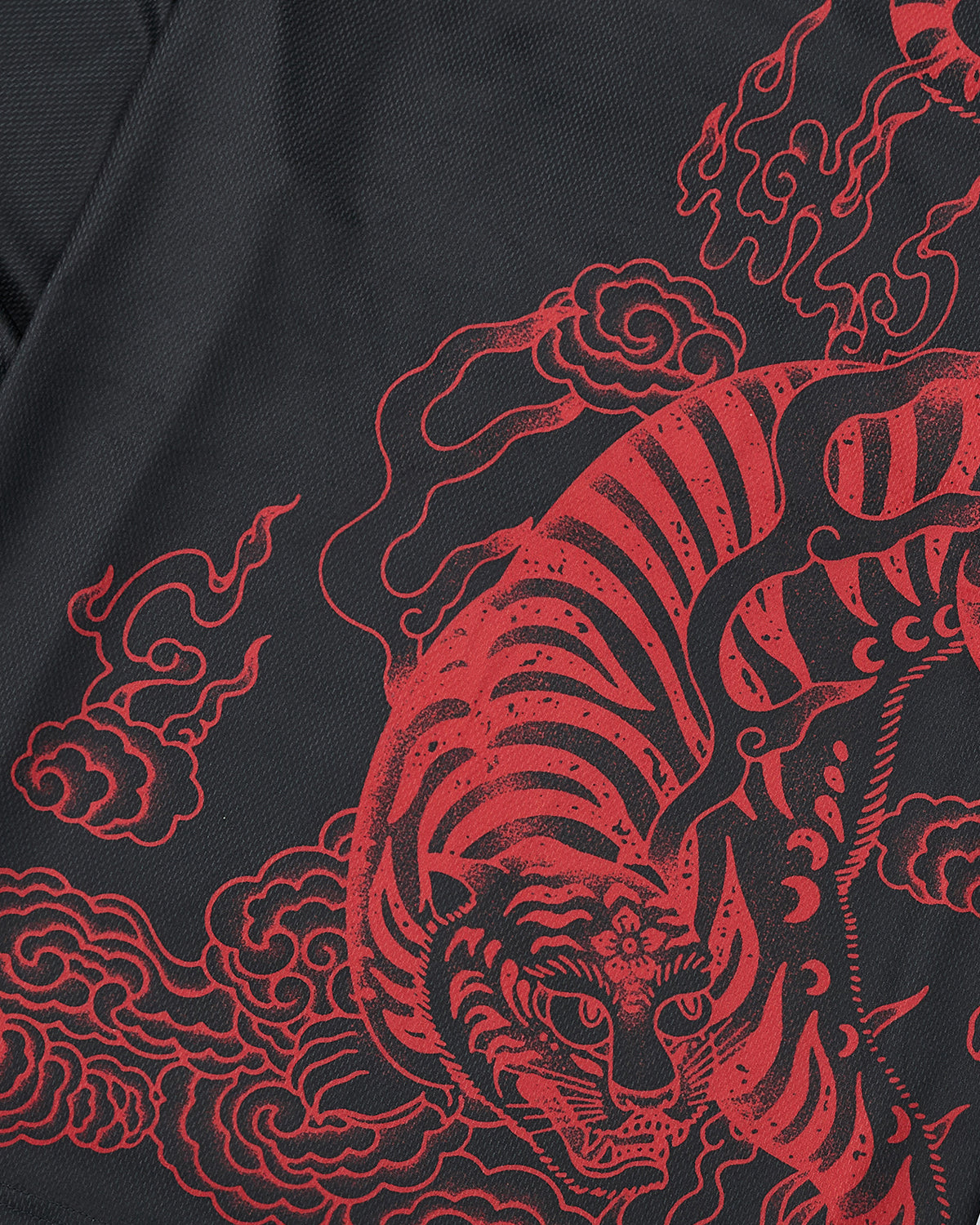 Featuring intricate red line art of a tiger surrounded by swirling clouds, the Sundae School KOREATOWN FOOTBALL JERSEY showcases detailed stripes and expressive facial features on a textured black fabric. This design blends traditional Korean folk motifs with modern K-Town fashion flair for a striking contemporary statement piece.