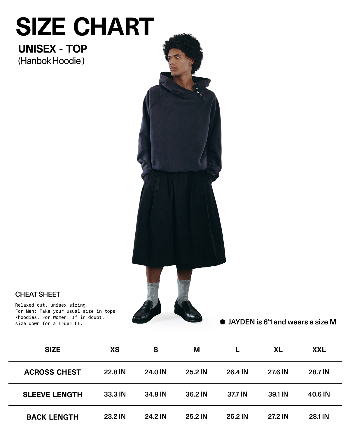 A person wearing the Sundae School NAVY WASH HANBOK HOODIE, featuring an oversized hood and paired with a wide black skirt, stands above a unisex hoodie size chart displaying measurements and fit notes for sizes XS through XXL—all crafted from custom cotton to ensure both comfort and style.
