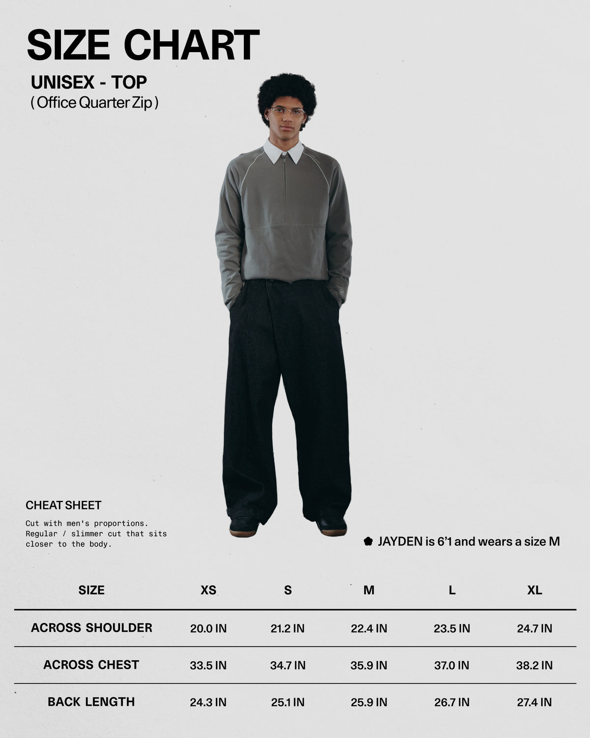 Size chart for a unisex office quarter zip top with a model wearing the garment.